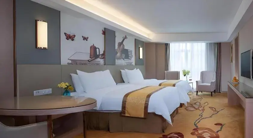 Bed in Vienna Hotel Changsha Wanjia Libei Road Tuqiao Metro Station Bed in Vienna Hotel Changsha Wanjia Libei Road Tuqiao Metro Station