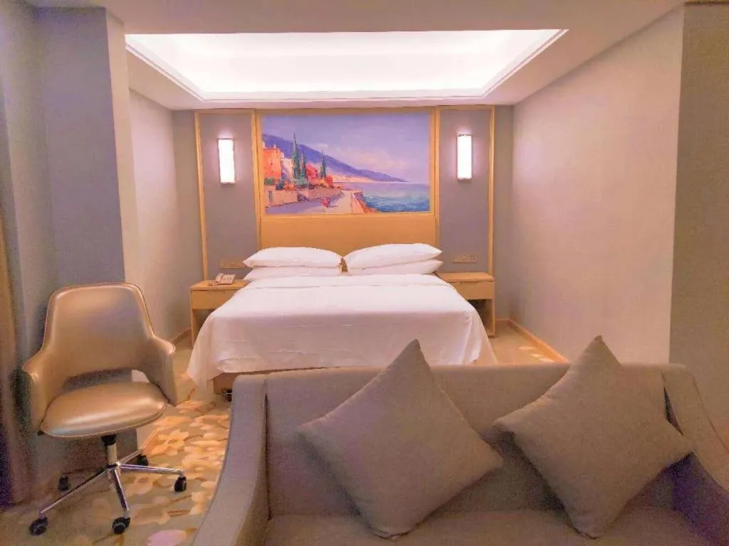 Bed in Vienna Hotel Guangxi Hechi Jinchengjiang Baima Street