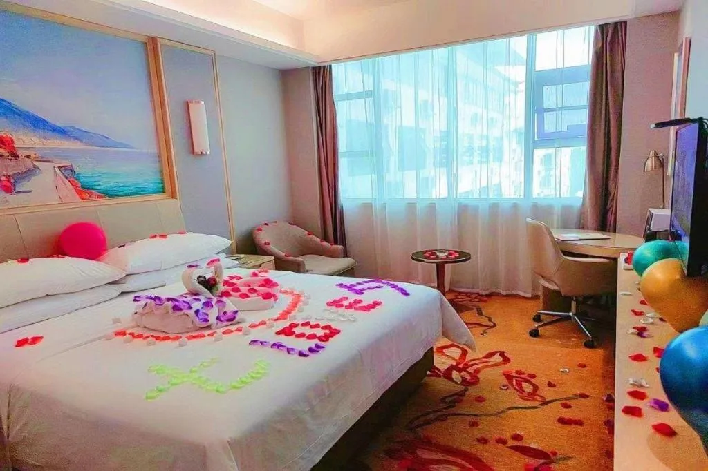 Bed in Vienna Hotel Guangxi Hechi Jinchengjiang Baima Street