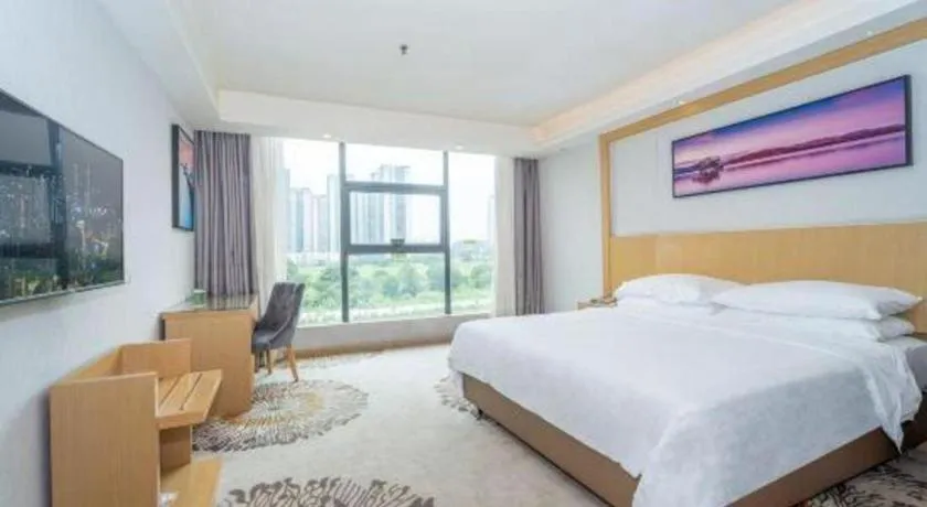 Bed in Vienna Hotel Guangzhou Huadu Financial Center Sunac Amusement Park