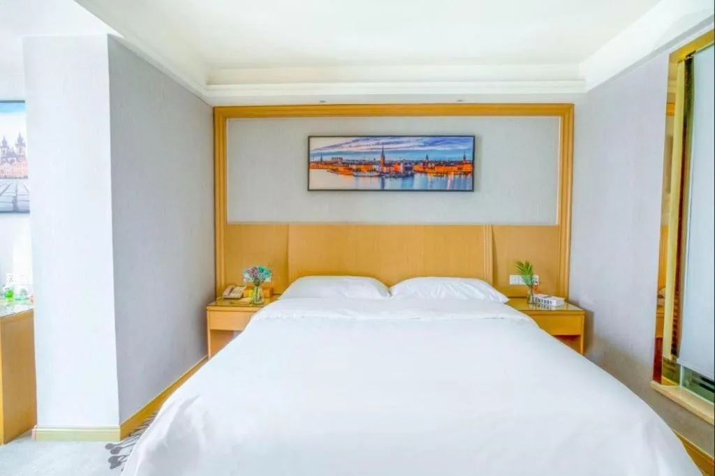 Bed in Vienna Hotel Guangzhou Huadu Financial Center Sunac Amusement Park