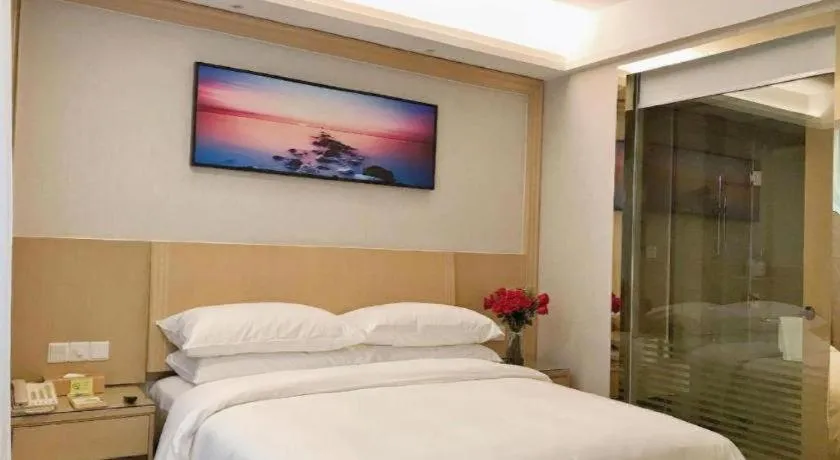 Bed in Vienna Hotel Guangzhou Huadu Financial Center Sunac Amusement Park