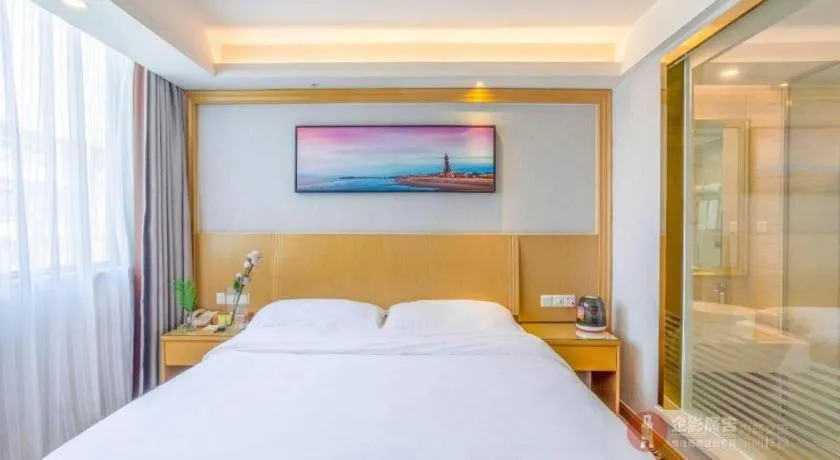 Bed in Vienna Hotel Guangzhou Huadu Financial Center Sunac Amusement Park