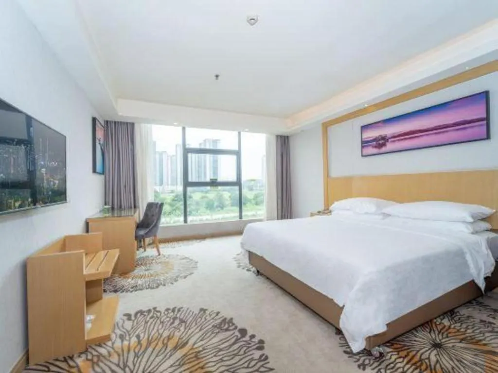 Bed in Vienna Hotel Guangzhou Huadu Financial Center Sunac Amusement Park
