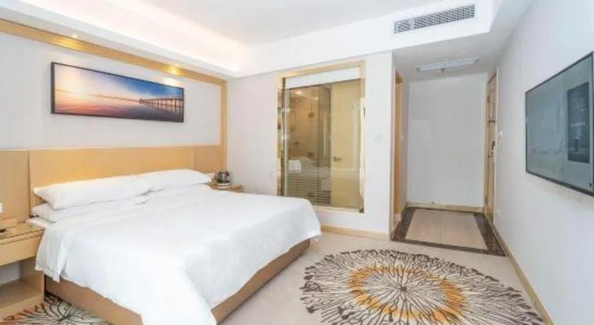 Bed in Vienna Hotel Guangzhou Huadu Financial Center Sunac Amusement Park