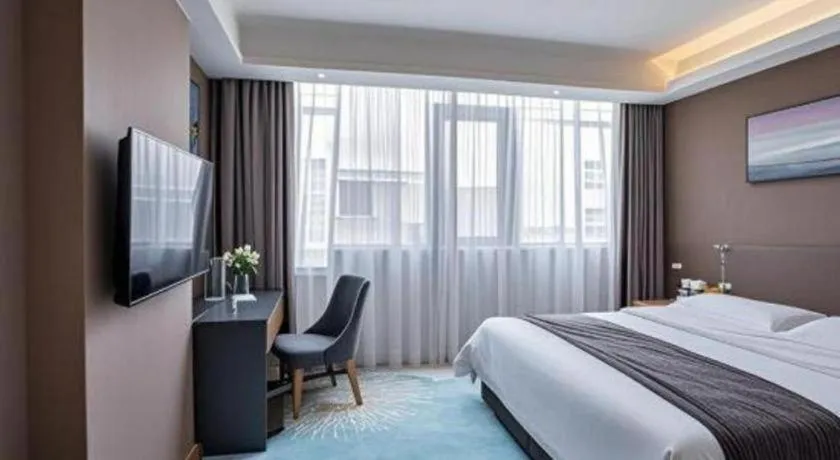 Bed in Vienna Hotel Guangzhou Huadu Financial Center Sunac Amusement Park
