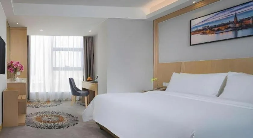 Bed in Vienna Hotel Guangzhou Huadu Financial Center Sunac Amusement Park