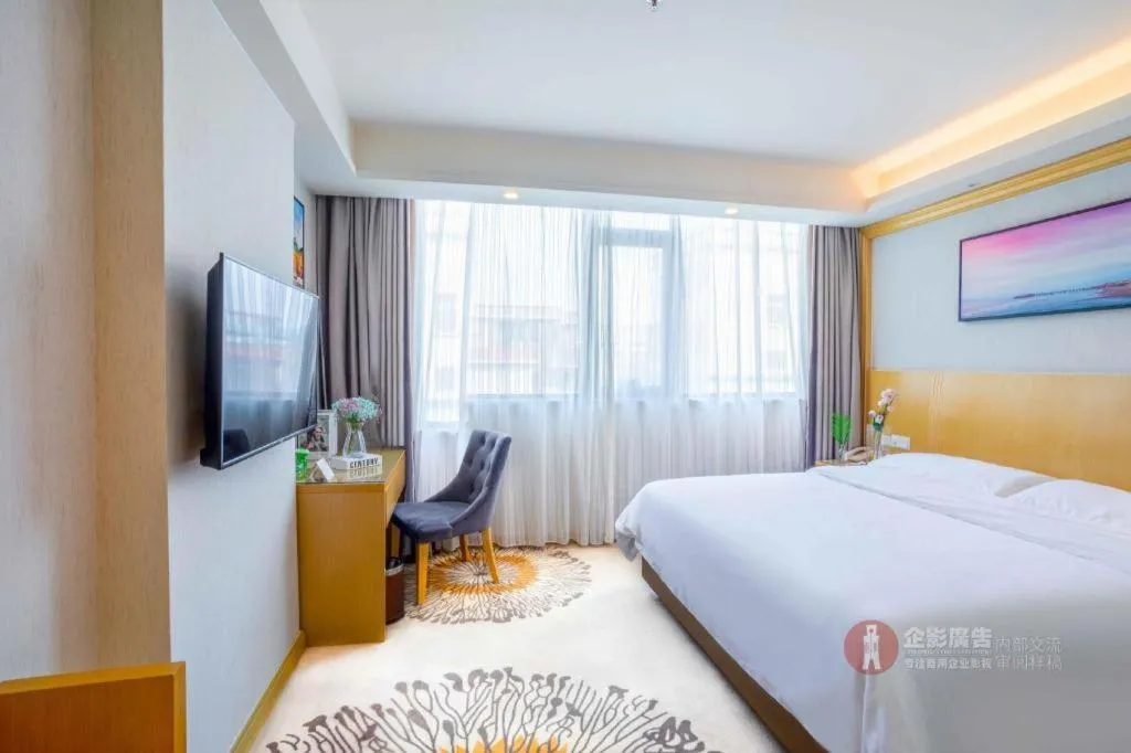 Bed in Vienna Hotel Guangzhou Huadu Financial Center Sunac Amusement Park