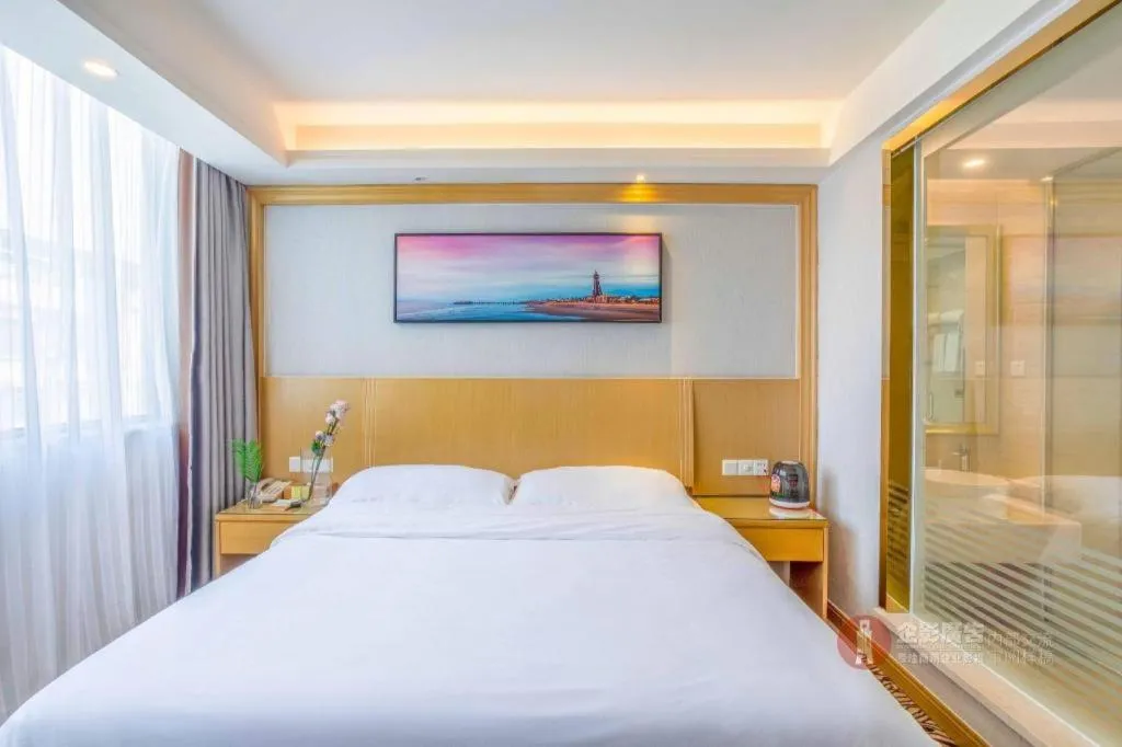 Bed in Vienna Hotel Guangzhou Huadu Financial Center Sunac Amusement Park