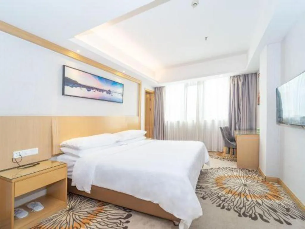 Bed in Vienna Hotel Guangzhou Huadu Financial Center Sunac Amusement Park