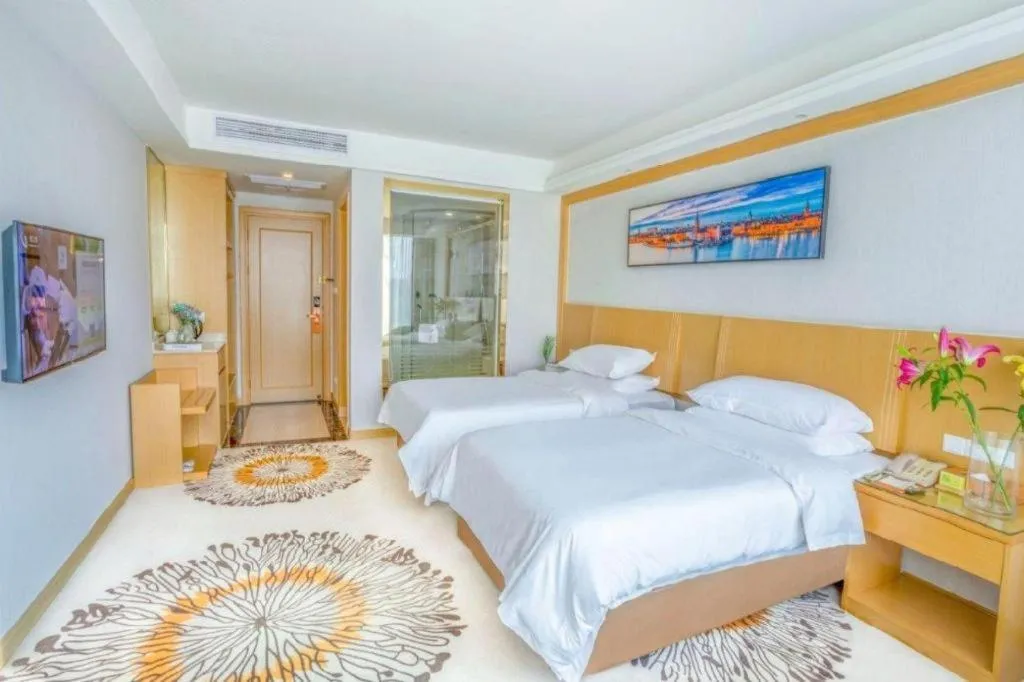 Bed in Vienna Hotel Guangzhou Huadu Financial Center Sunac Amusement Park