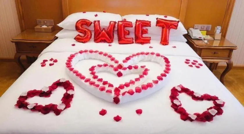 Bed in Vienna Hotel Guangzhou Huadu Financial Center Sunac Amusement Park