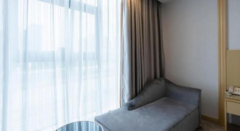 Bed in Vienna Hotel Guangzhou Huadu Financial Center Sunac Amusement Park