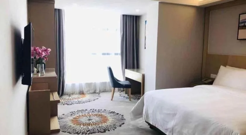 Bed in Vienna Hotel Guangzhou Huadu Financial Center Sunac Amusement Park