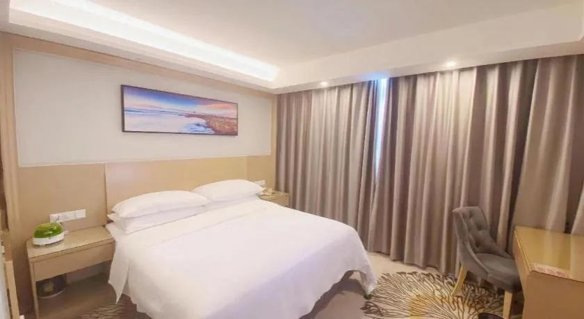 Bed in Vienna Hotel Guangzhou Huadu Financial Center Sunac Amusement Park