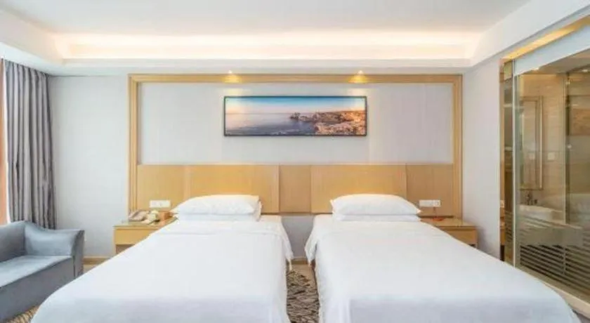 Bed in Vienna Hotel Guangzhou Huadu Financial Center Sunac Amusement Park