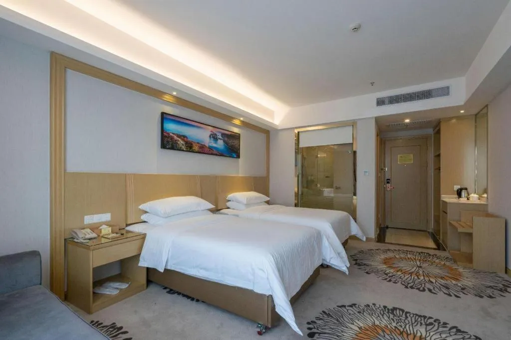 Bed in Vienna Hotel Guangzhou Huadu Financial Center Sunac Amusement Park