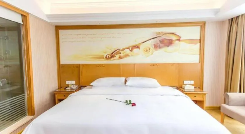 Bed in Vienna Hotel Jiangsu Kunshan Changjiang North Road Fenghuangcheng