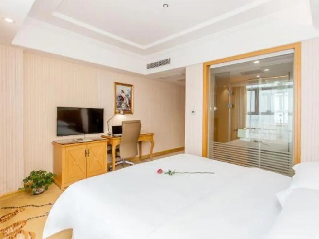 Bed in Vienna Hotel Jiangsu Kunshan Changjiang North Road Fenghuangcheng