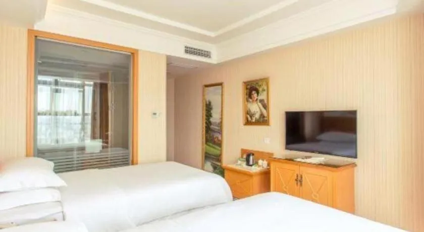 Bed in Vienna Hotel Jiangsu Kunshan Changjiang North Road Fenghuangcheng