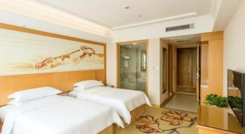 Bed in Vienna Hotel Jiangsu Kunshan Changjiang North Road Fenghuangcheng