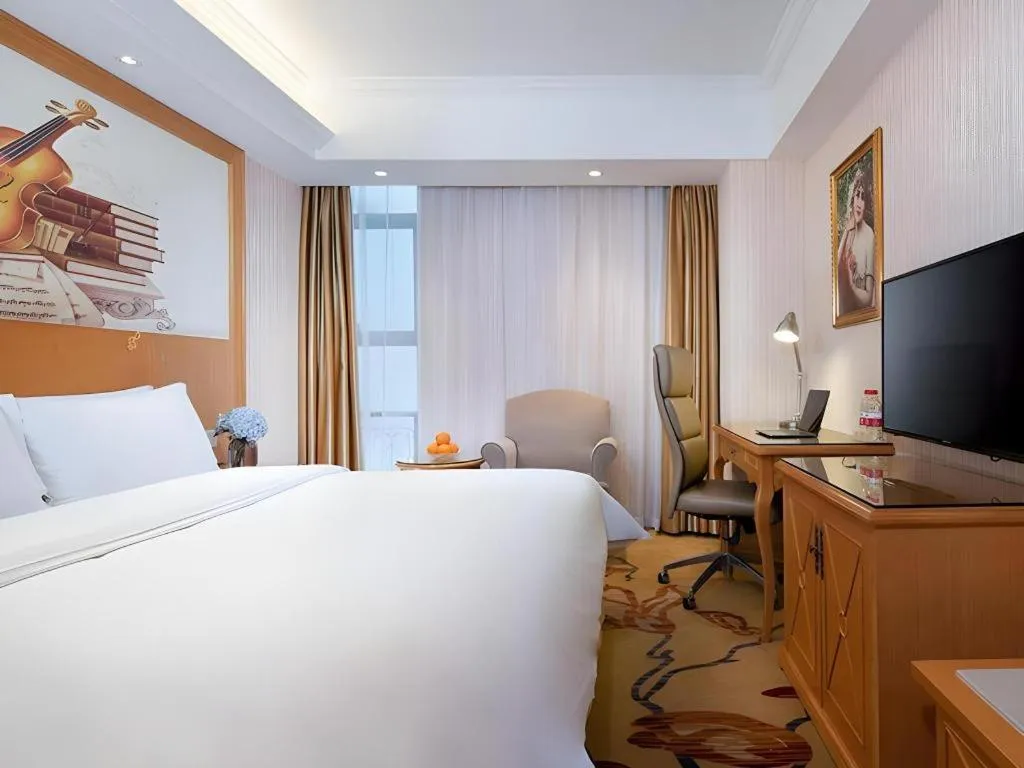Bed in Vienna Hotel Jiangsu Kunshan Changjiang North Road Fenghuangcheng