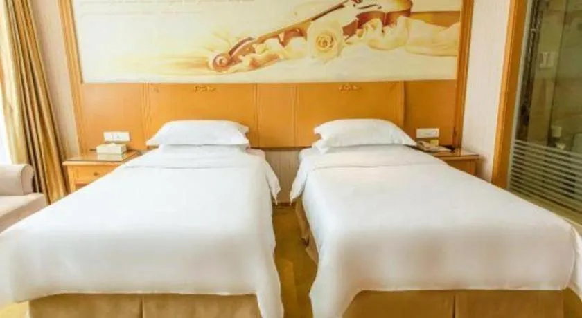 Bed in Vienna Hotel Jiangsu Kunshan Changjiang North Road Fenghuangcheng