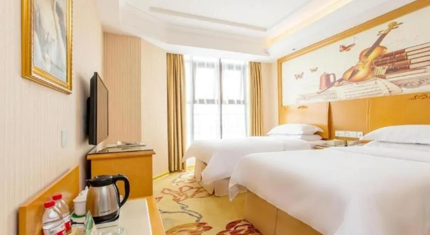 Bed in Vienna Hotel Jiangsu Kunshan Changjiang North Road Fenghuangcheng