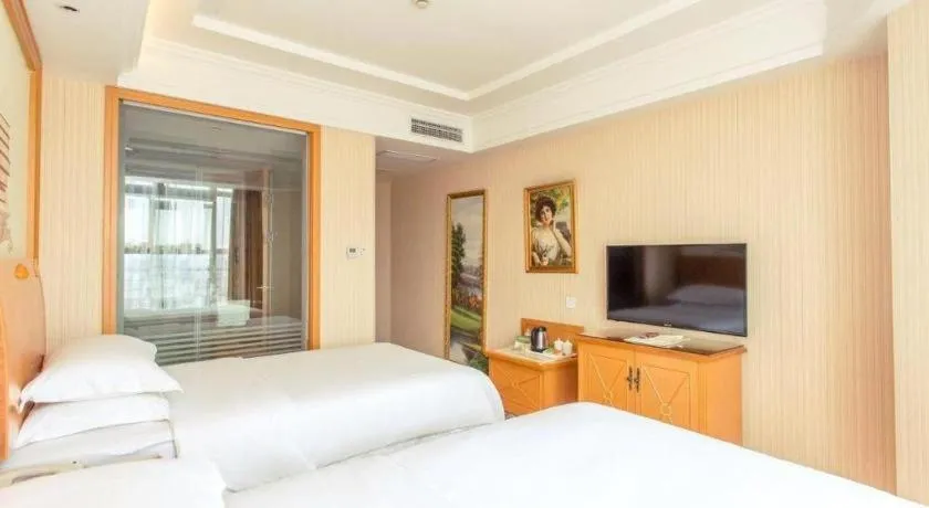 Bed in Vienna Hotel Jiangsu Kunshan Changjiang North Road Fenghuangcheng