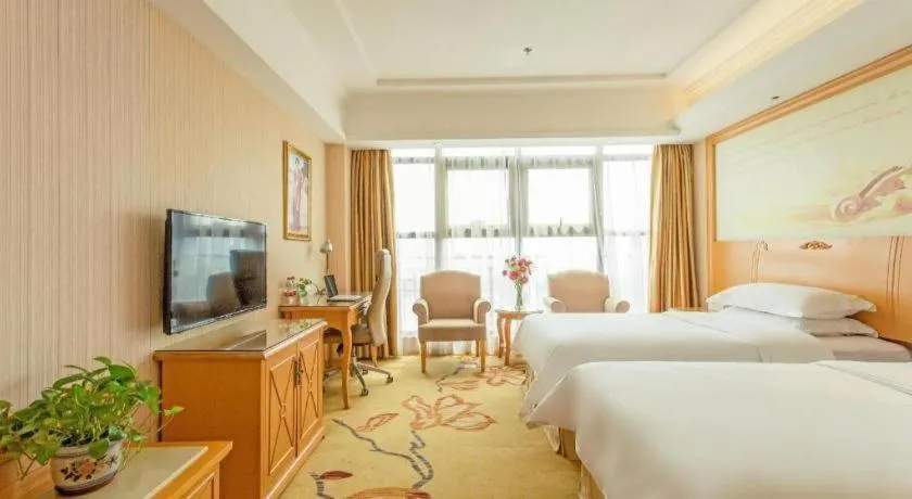 Bed in Vienna Hotel Jiangsu Kunshan Changjiang North Road Fenghuangcheng
