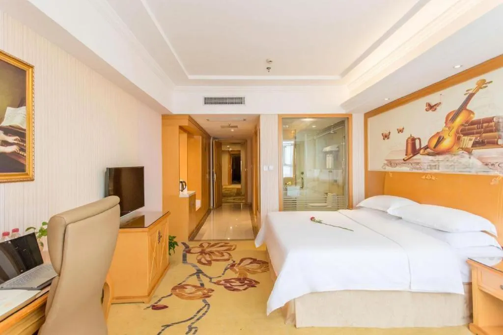 Bed in Vienna Hotel Jiangsu Kunshan Changjiang North Road Fenghuangcheng