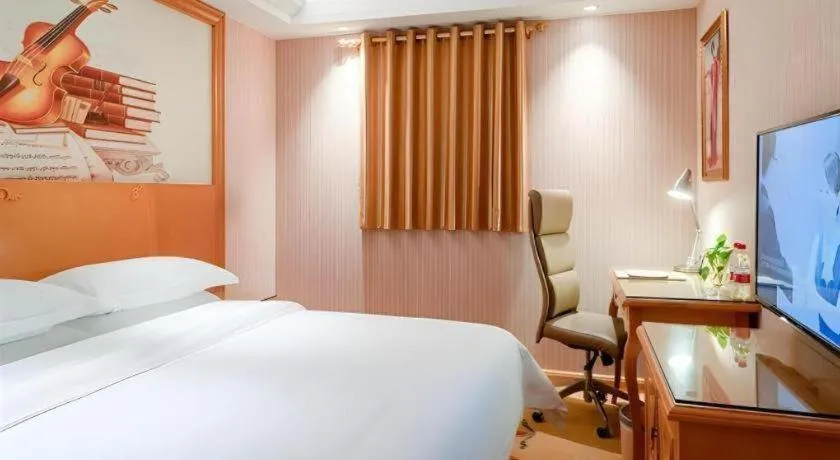 Bed in Vienna Hotel Jiangsu Kunshan Changjiang North Road Fenghuangcheng