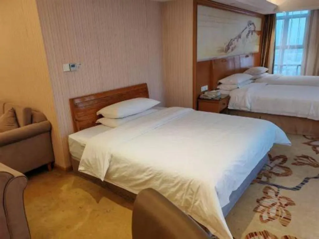 Bed in Vienna Hotel Jiangsu Kunshan Changjiang North Road Fenghuangcheng
