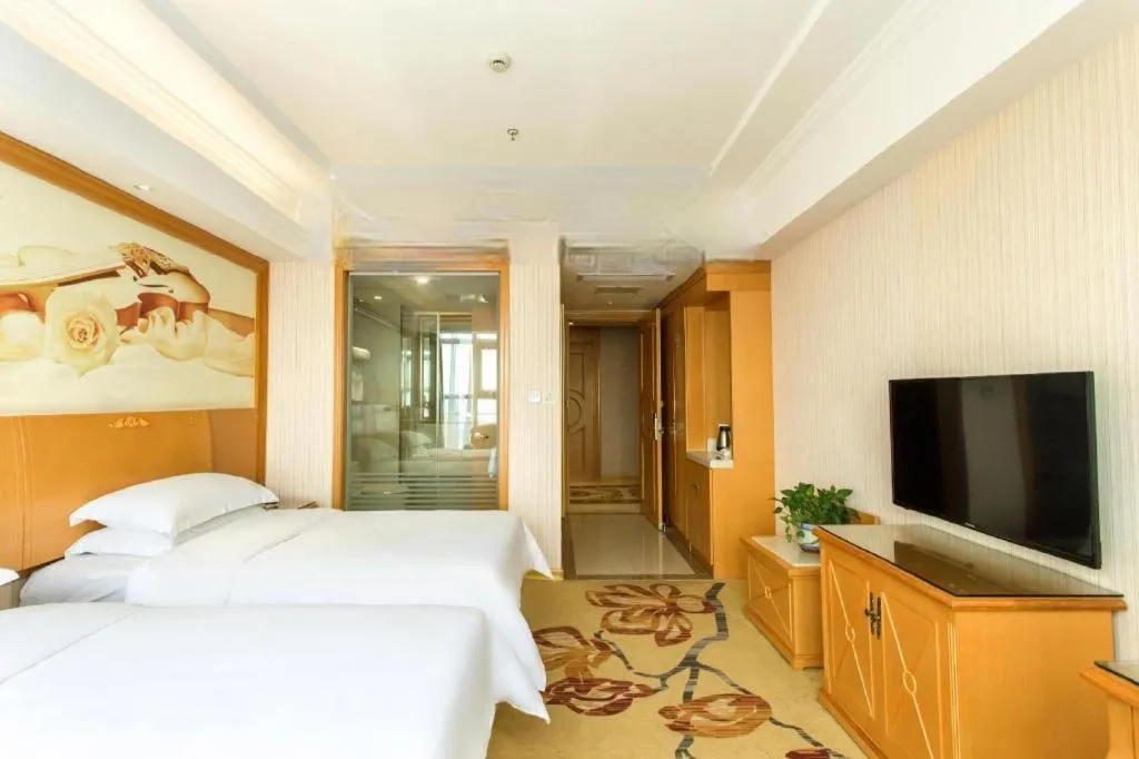 Bed in Vienna Hotel Jiangsu Kunshan Changjiang North Road Fenghuangcheng