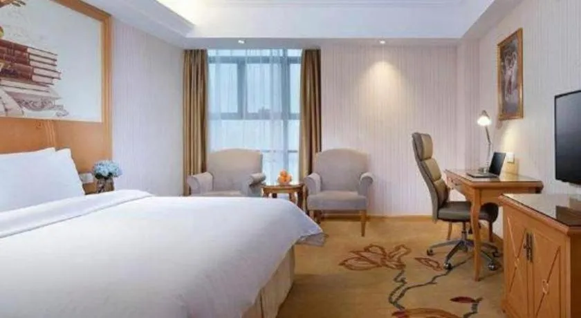Bed in Vienna Hotel Jiangsu Kunshan Changjiang North Road Fenghuangcheng