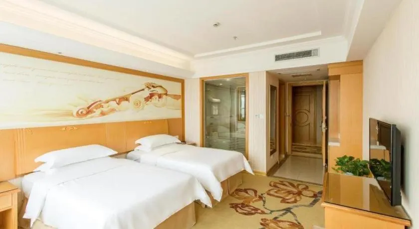 Bed in Vienna Hotel Jiangsu Kunshan Changjiang North Road Fenghuangcheng