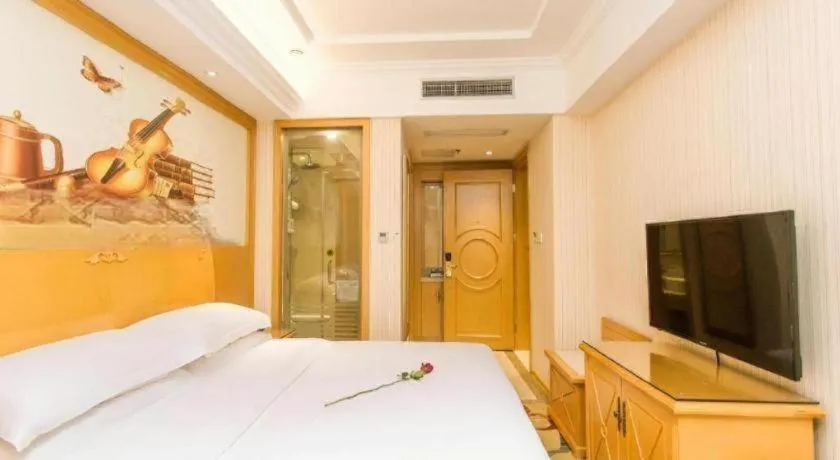 Bed in Vienna Hotel Jiangsu Kunshan Changjiang North Road Fenghuangcheng