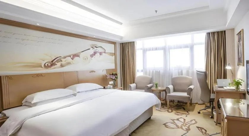 Bed in Vienna Hotel Jiangsu Kunshan Changjiang North Road Fenghuangcheng
