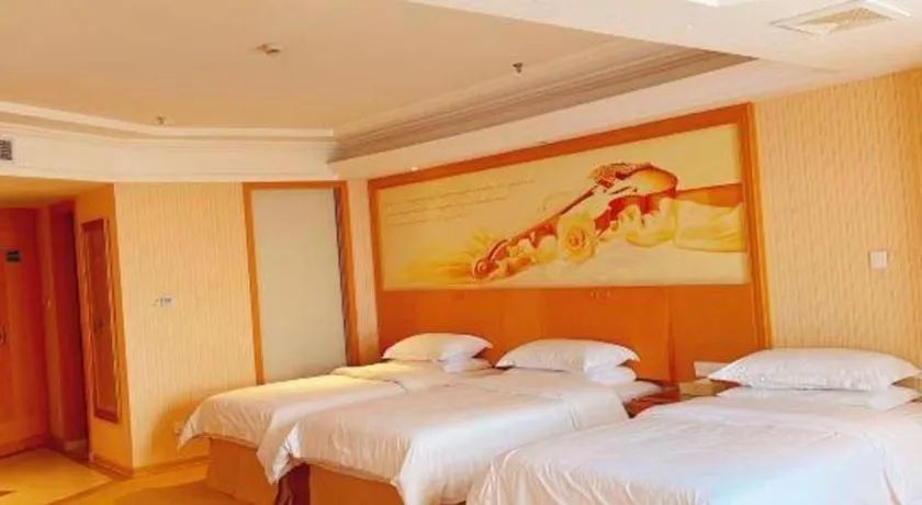 Bed in Vienna Hotel Jiangsu Kunshan Changjiang North Road Fenghuangcheng