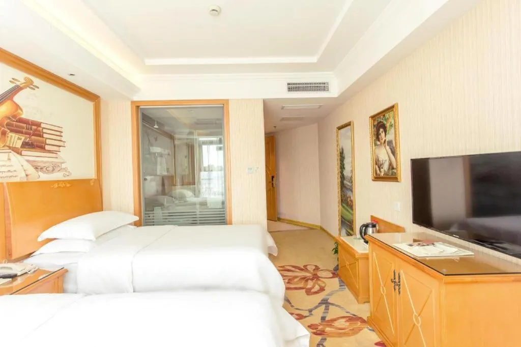 Bed in Vienna Hotel Jiangsu Kunshan Changjiang North Road Fenghuangcheng