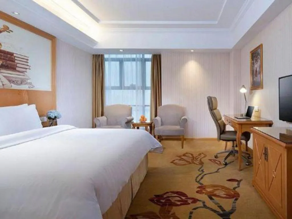 Bed in Vienna Hotel Jiangsu Kunshan Changjiang North Road Fenghuangcheng