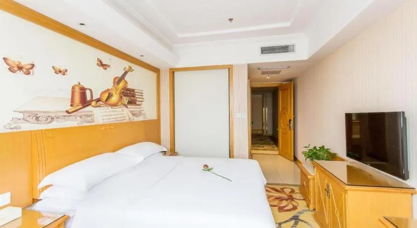 Bed in Vienna Hotel Jiangsu Kunshan Changjiang North Road Fenghuangcheng