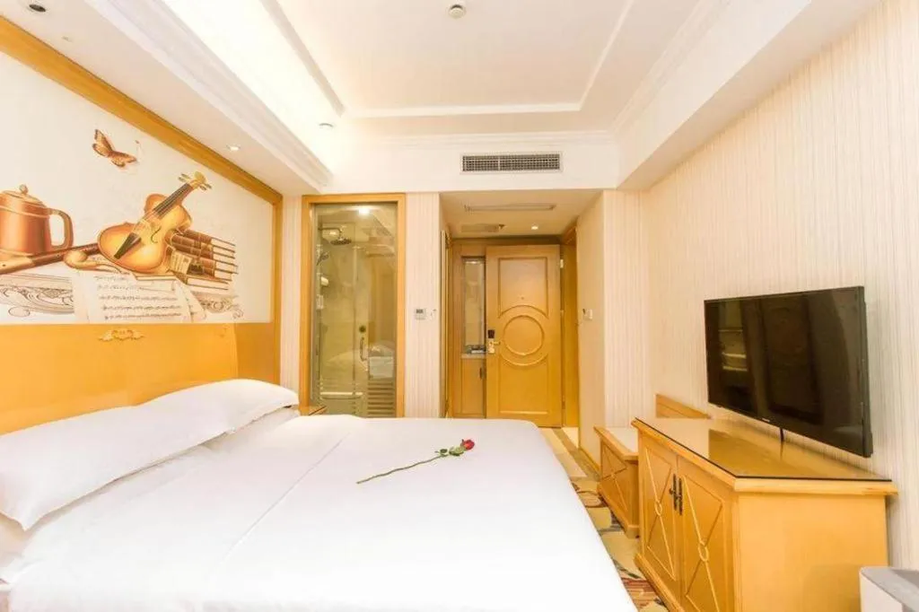 Bed in Vienna Hotel Jiangsu Kunshan Changjiang North Road Fenghuangcheng