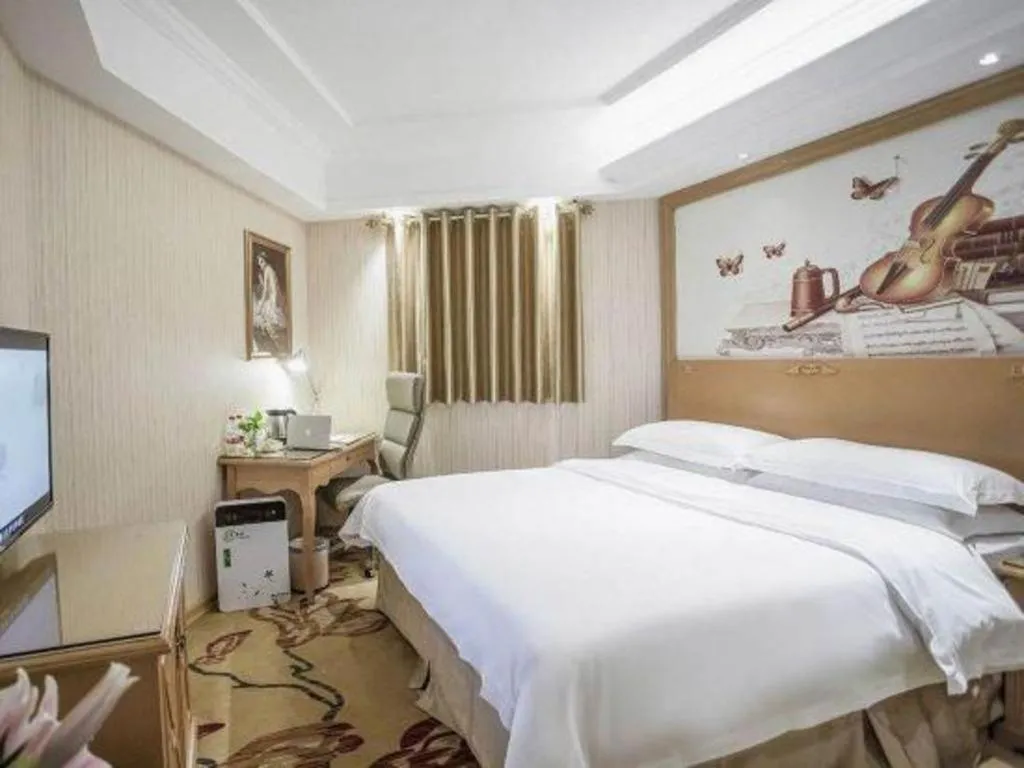 Bed in Vienna Hotel Jiangsu Kunshan Changjiang North Road Fenghuangcheng