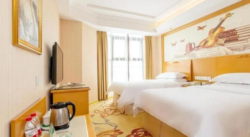 Bed in Vienna Hotel Jiangsu Kunshan Changjiang North Road Fenghuangcheng
