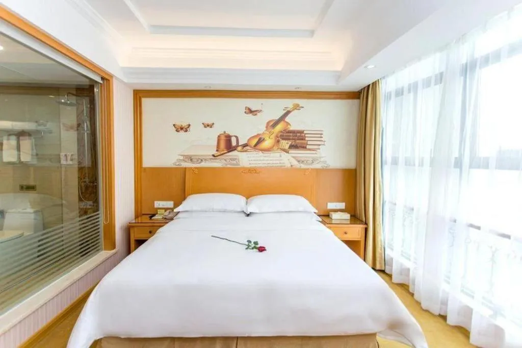 Bed in Vienna Hotel Jiangsu Kunshan Changjiang North Road Fenghuangcheng