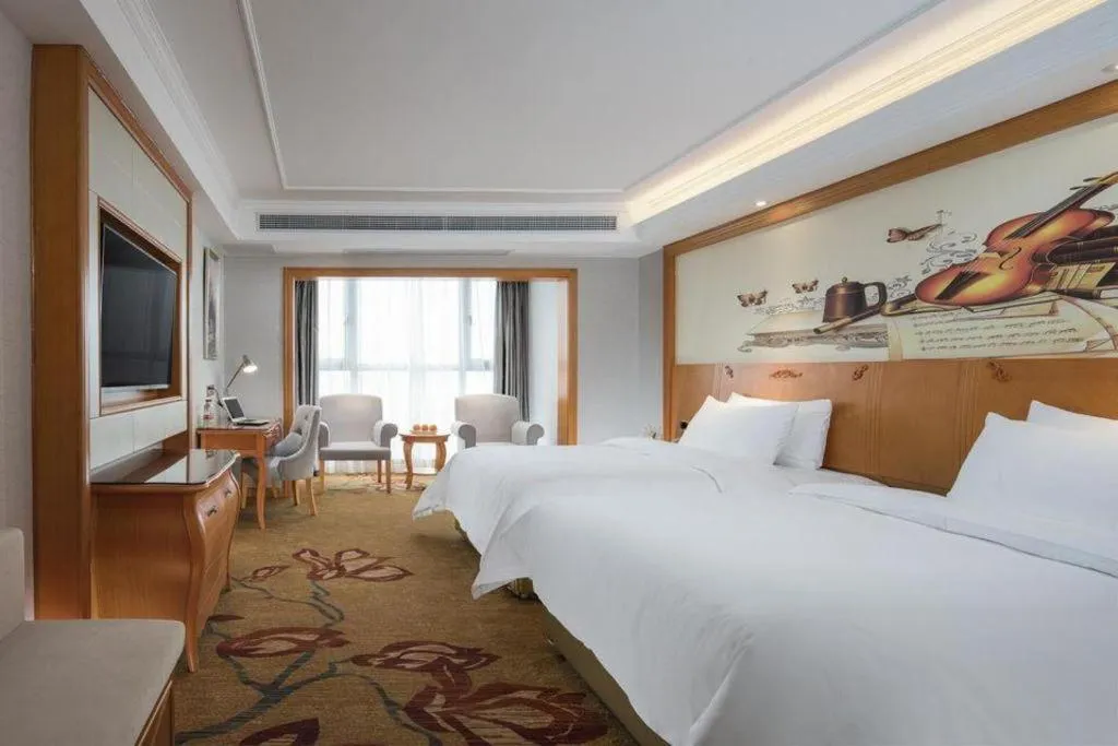 Bed in Vienna Hotel Guiyang North Station Dream City