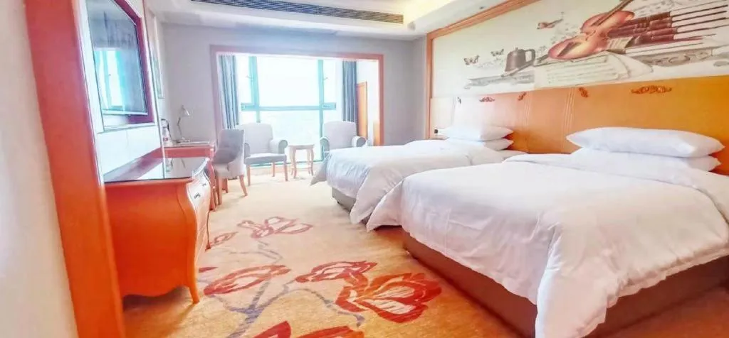 Bed in Vienna Hotel Guiyang North Station Dream City