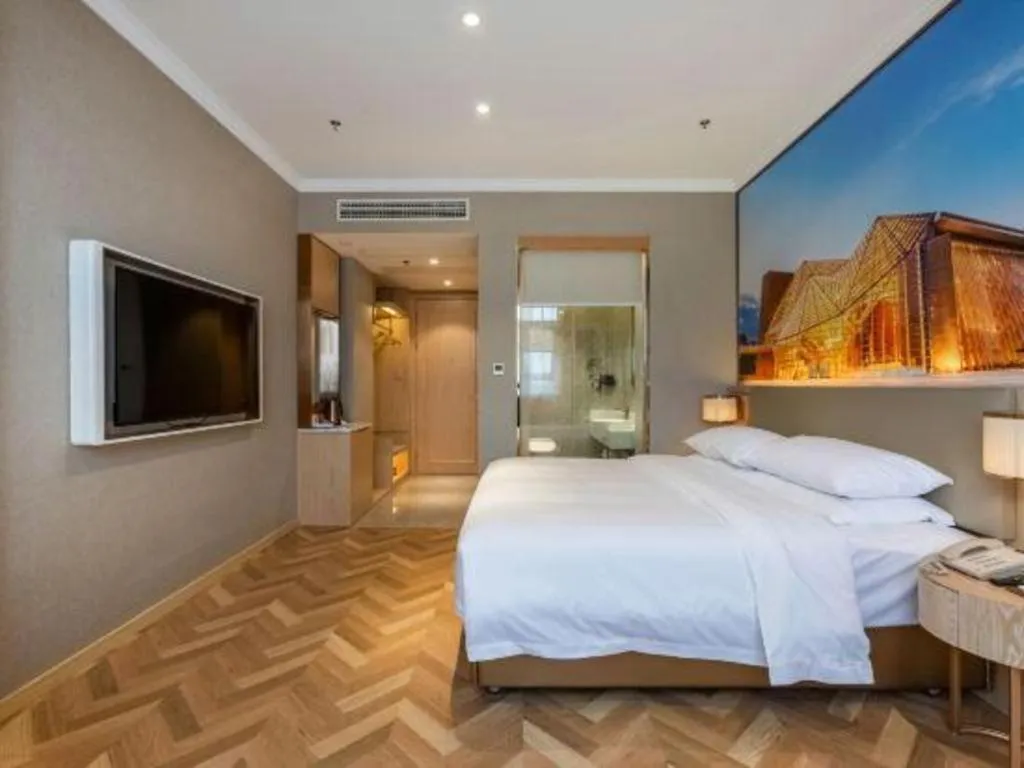 Bed in Vienna Hotel Jiangsu Dongtai Wanghai West Road