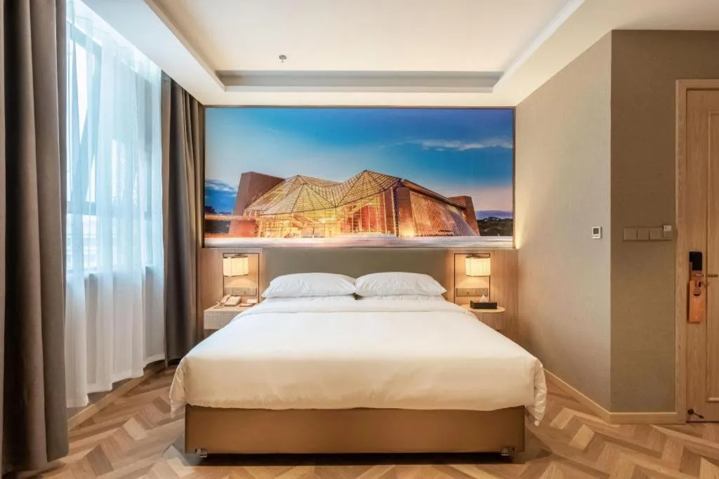 Bed in Vienna Hotel Jiangsu Dongtai Wanghai West Road